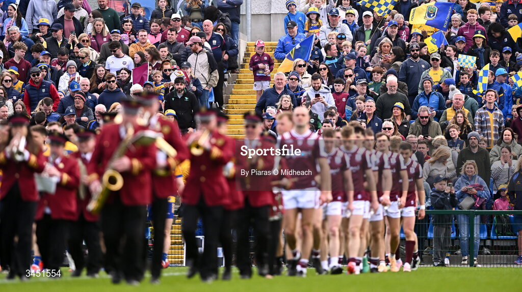 10 May 2026; A young Galway supporter watches from the steps of the stand as the Galway team march by during the parade before the Connacht GAA Football Senior Championship final match between Roscommon and Galway at King & Moffatt Dr Hyde Park in Roscommon. Photo by Piaras Ó Mídheach/Sportsfile