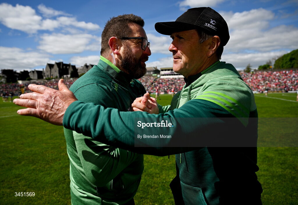10 May 2026; Kerry head coach Cian O'Neill, left, and manager Jack O'Connor celebrate at the final whistle of the Munster GAA Football Senior Championship final match between Kerry and Cork at Fitzgerald Stadium in Killarney, Kerry. Photo by Brendan Moran/Sportsfile