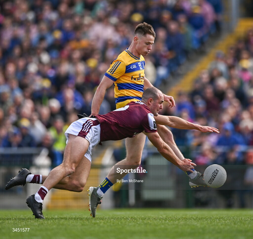 10 May 2026; Darragh Heneghan of Roscommon scores his side's second goal despite the tackle of John Maher of Galway during the Connacht GAA Football Senior Championship final match between Roscommon and Galway at King & Moffatt Dr Hyde Park in Roscommon. Photo by Ben McShane/Sportsfile