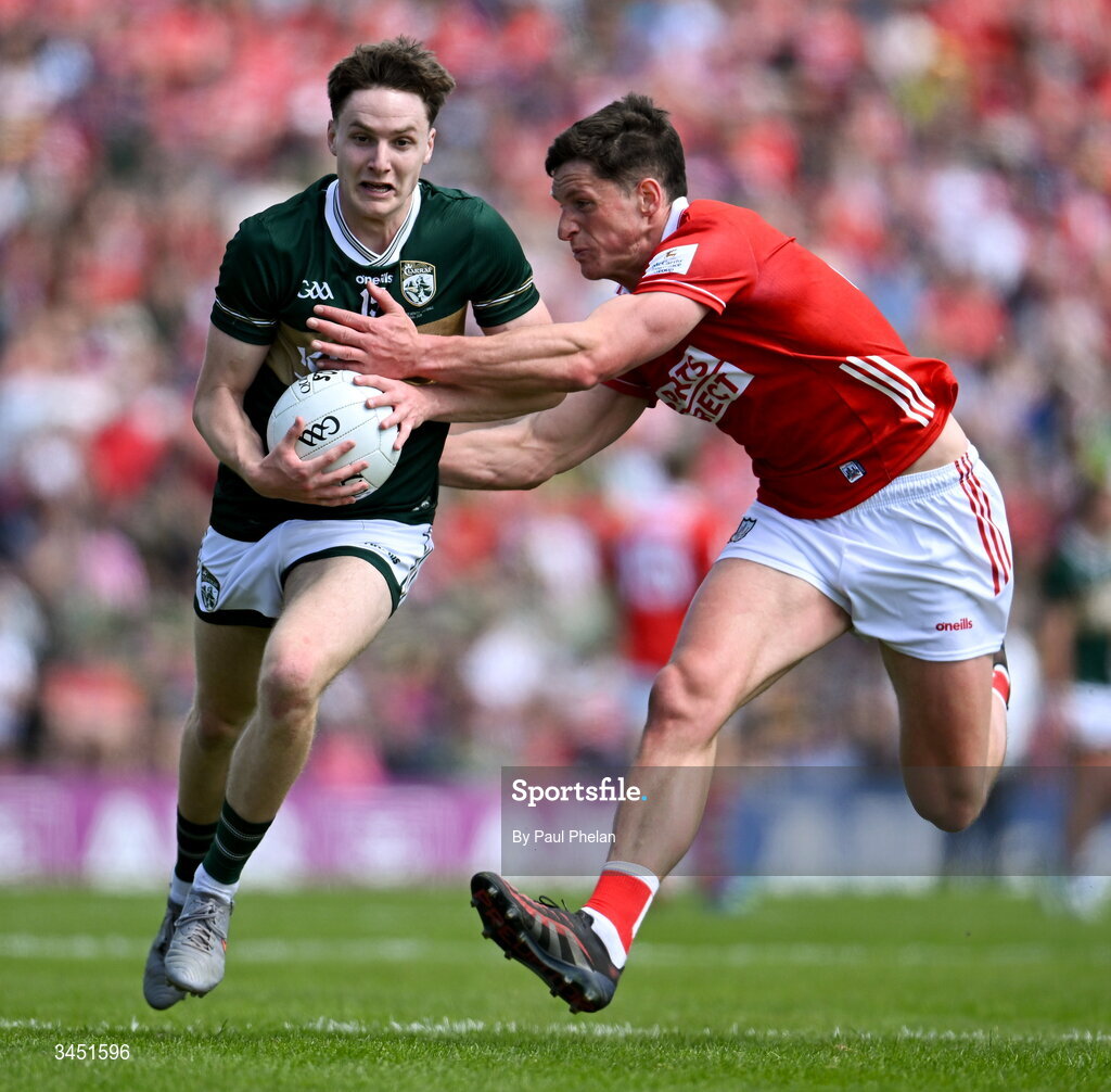 10 May 2026; Keith Evans of Kerry in action against Colm O’Callaghan of Cork during the Munster GAA Football Senior Championship final match between Kerry and Cork at Fitzgerald Stadium in Killarney, Kerry. Photo by Paul Phelan/Sportsfile