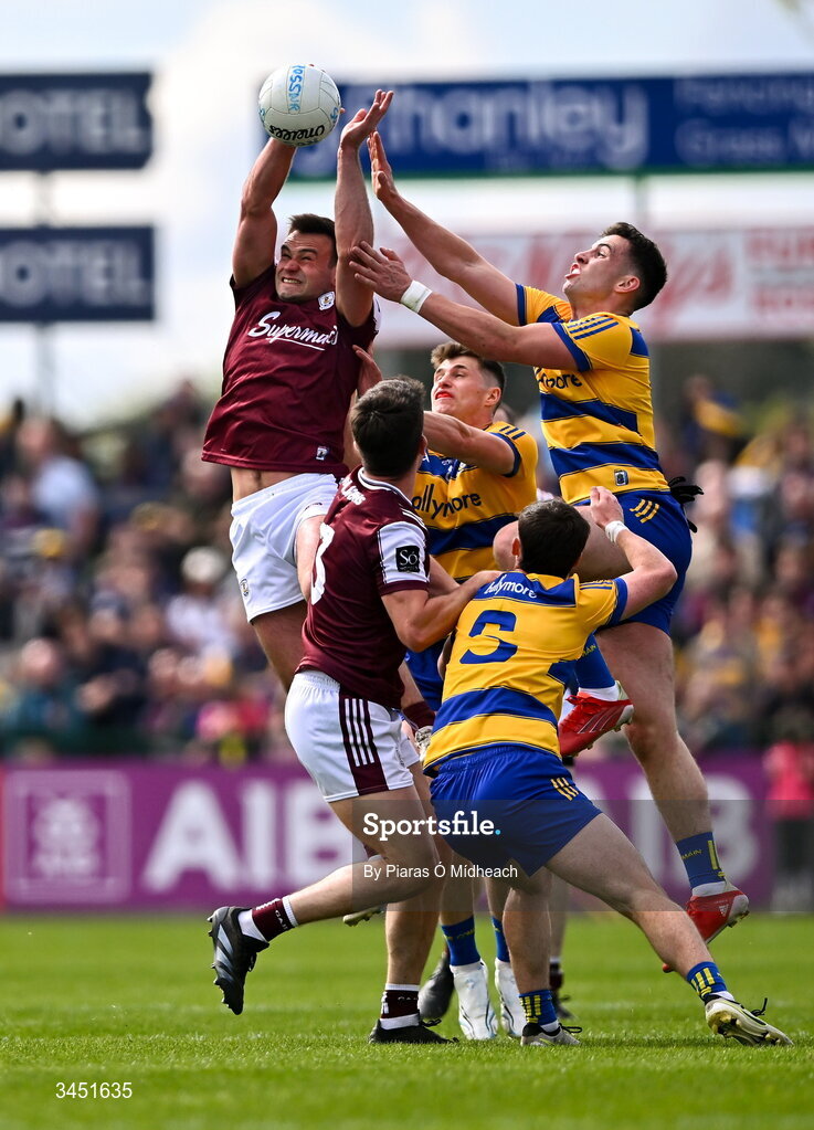 10 May 2026; Cillian McDaid of Galway gets to the ball ahead of Conor Ryan of Roscommon, right, during the Connacht GAA Football Senior Championship final match between Roscommon and Galway at King & Moffatt Dr Hyde Park in Roscommon. Photo by Piaras Ó Mídheach/Sportsfile