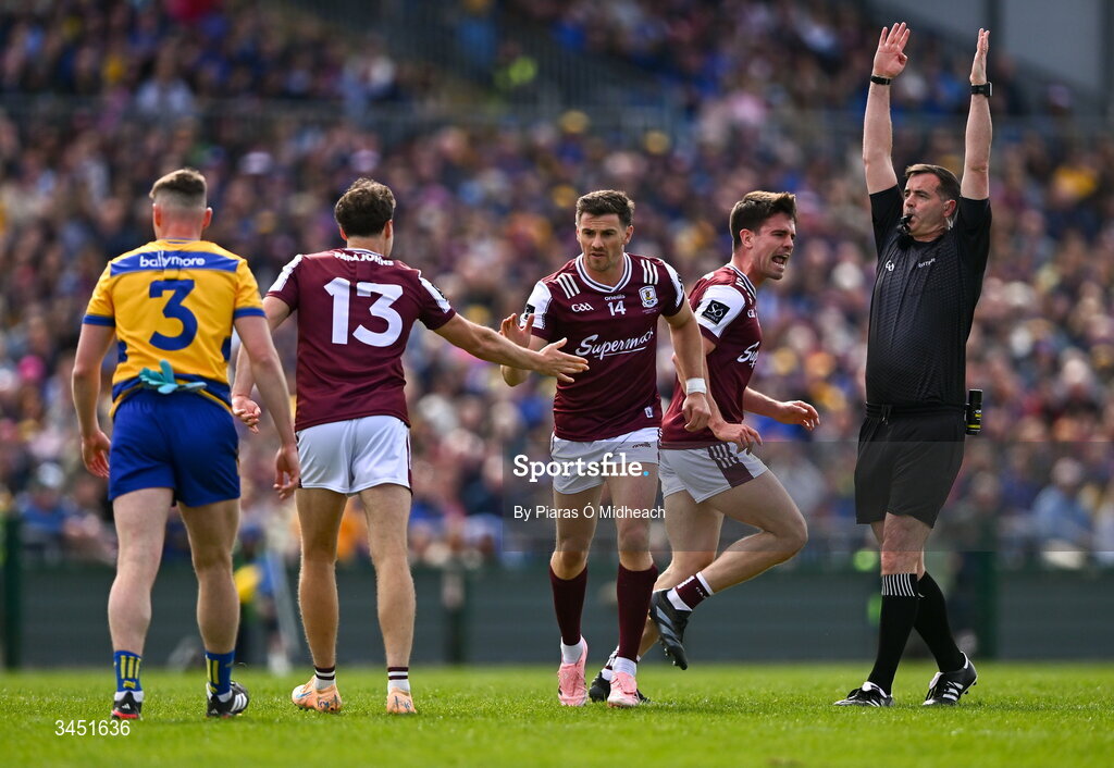 10 May 2026; Shane Walsh of Galway, 14, celebrates with team-mates Robert Finnerty, 13, and Seán Kelly after scoring a two-pointer as referee Seán Hurson signals for a two-pointer during the Connacht GAA Football Senior Championship final match between Roscommon and Galway at King & Moffatt Dr Hyde Park in Roscommon. Photo by Piaras Ó Mídheach/Sportsfile