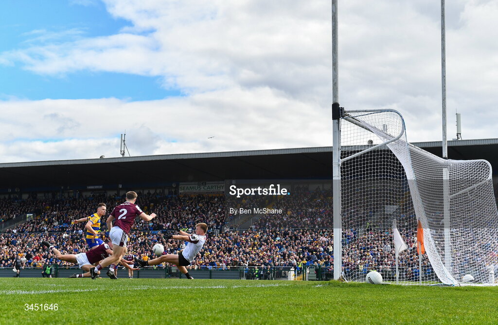 10 May 2026; Darragh Heneghan of Roscommon scores his side's second goal despite the tackle of John Maher and Galway goalkeeper Conor Flaherty during the Connacht GAA Football Senior Championship final match between Roscommon and Galway at King & Moffatt Dr Hyde Park in Roscommon. Photo by Ben McShane/Sportsfile