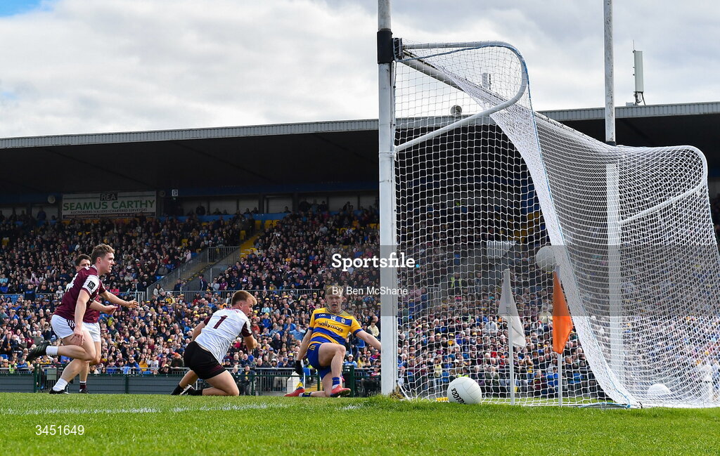 10 May 2026; Robert Heneghan of Roscommon scores his side's first goal past Galway goalkeeper Conor Flaherty during the Connacht GAA Football Senior Championship final match between Roscommon and Galway at King & Moffatt Dr Hyde Park in Roscommon. Photo by Ben McShane/Sportsfile