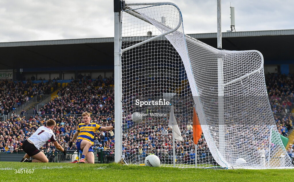 10 May 2026; Robert Heneghan of Roscommon scores his side's first goal past Galway goalkeeper Conor Flaherty during the Connacht GAA Football Senior Championship final match between Roscommon and Galway at King & Moffatt Dr Hyde Park in Roscommon. Photo by Ben McShane/Sportsfile