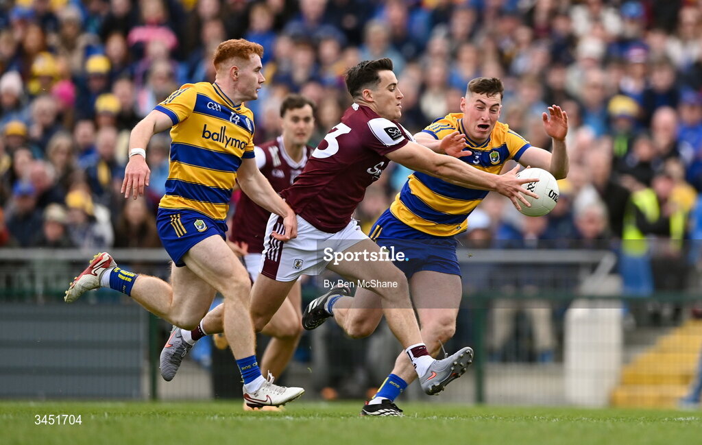 10 May 2026; Finnian Ó Laoi of Galway in action against Colm Neary, left, and Caelim Keogh of Roscommon during the Connacht GAA Football Senior Championship final match between Roscommon and Galway at King & Moffatt Dr Hyde Park in Roscommon. Photo by Ben McShane/Sportsfile