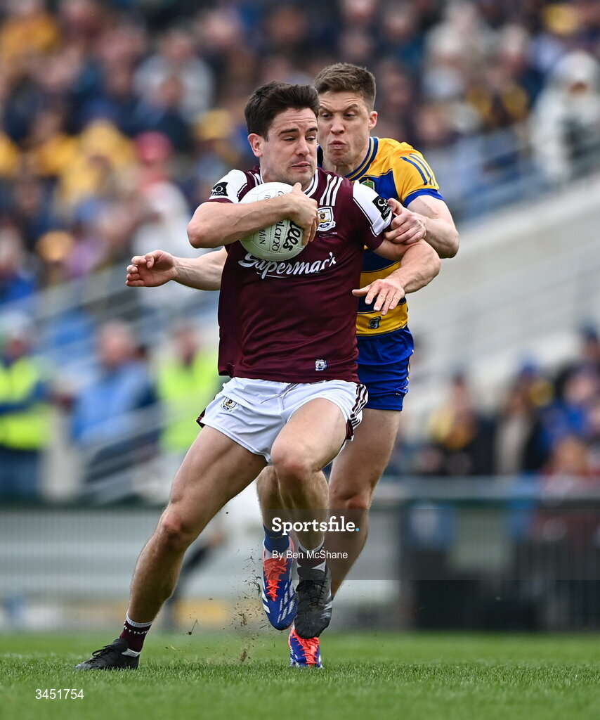 10 May 2026; Seán Kelly of Galway is tackled by Ronan Daly of Roscommon during the Connacht GAA Football Senior Championship final match between Roscommon and Galway at King & Moffatt Dr Hyde Park in Roscommon. Photo by Ben McShane/Sportsfile