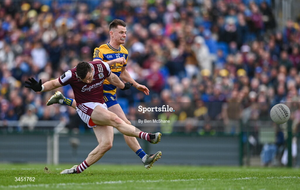 10 May 2026; Damien Comer of Galway scores his side's second goal despite the attention of Darragh Heneghan of Roscommon during the Connacht GAA Football Senior Championship final match between Roscommon and Galway at King & Moffatt Dr Hyde Park in Roscommon. Photo by Ben McShane/Sportsfile