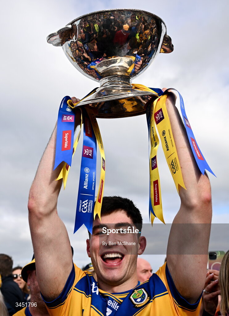 10 May 2026; Senan Lambe of Roscommon lifts the Nestor Cup after victory in the Connacht GAA Football Senior Championship final match between Roscommon and Galway at King & Moffatt Dr Hyde Park in Roscommon. Photo by Ben McShane/Sportsfile
