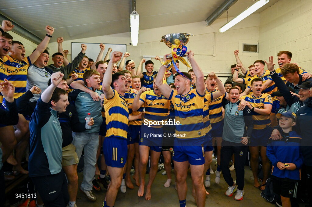 10 May 2026; Roscommon captain Diarmuid Murtagh celebrates with the Nestor Cup in the winning dressing room after victory in the Connacht GAA Football Senior Championship final match between Roscommon and Galway at King & Moffatt Dr Hyde Park in Roscommon. Photo by Piaras Ó Mídheach/Sportsfile