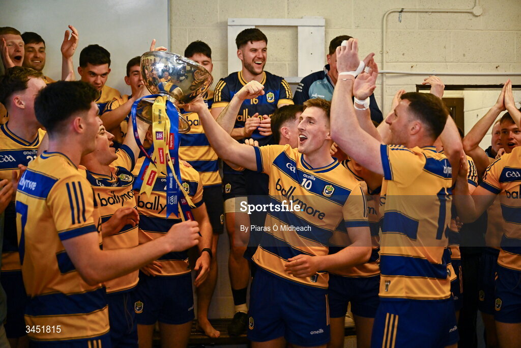 10 May 2026; Dylan Ruane of Roscommon celebrates with the Nestor Cup in the winning dressing room after victory in the Connacht GAA Football Senior Championship final match between Roscommon and Galway at King & Moffatt Dr Hyde Park in Roscommon. Photo by Piaras Ó Mídheach/Sportsfile