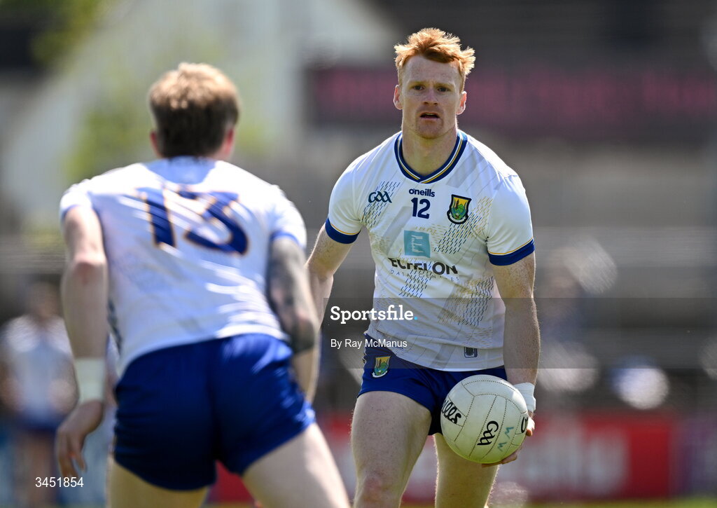 10 May 2026; Christopher O'Brien of Wicklow passes to tean mate Oisin McGraynor during the Táilteann Cup round 1 match between Laois and Wicklow at Laois Hire O'Moore Park in Portlaoise, Laois. Photo by Ray McManus/Sportsfile