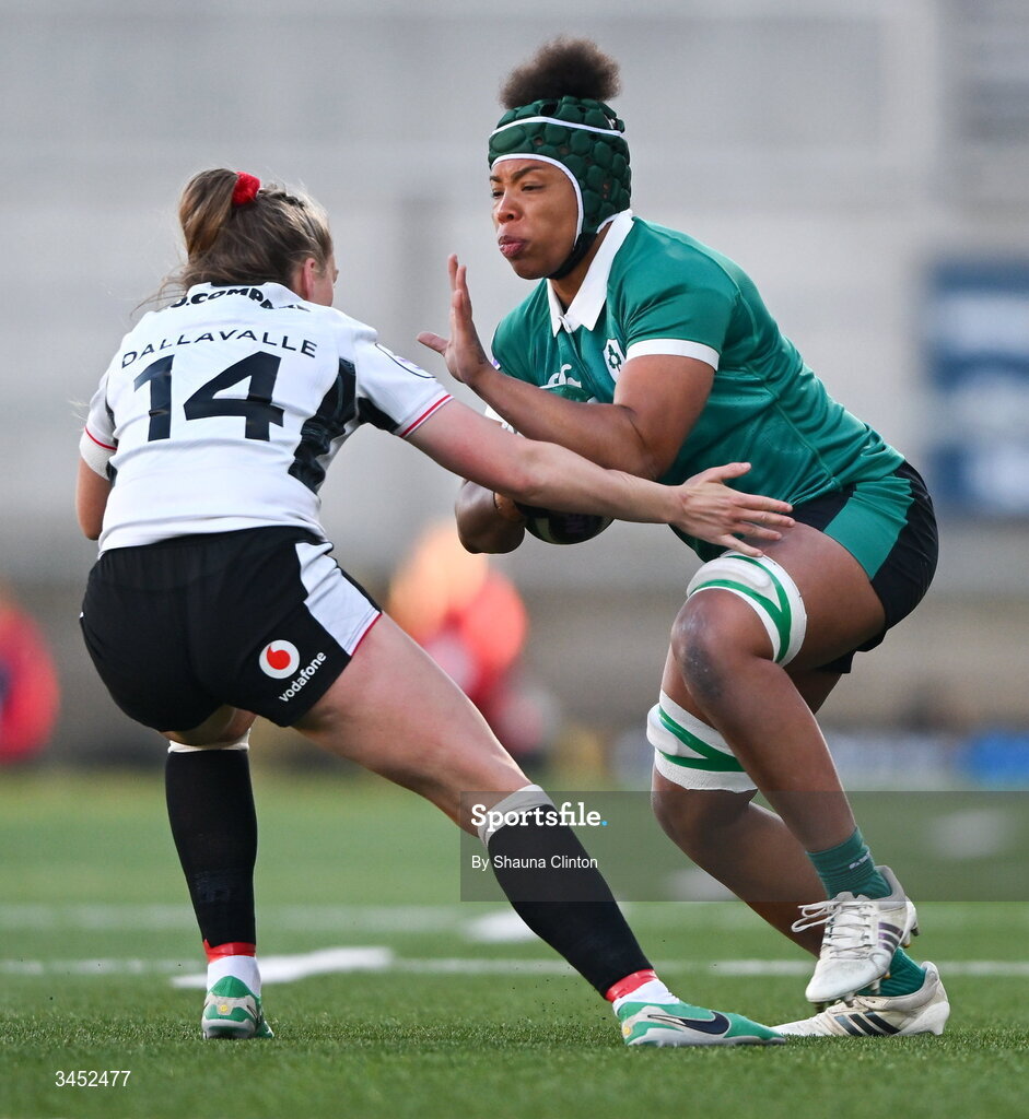 9 May 2026; Grace Moore of Ireland in action against Hannah Dallavalle of Wales during the Women's 6 Nations Rugby Championship match between Ireland and Wales at Affidea Stadium in Belfast. Photo by Shauna Clinton/Sportsfile