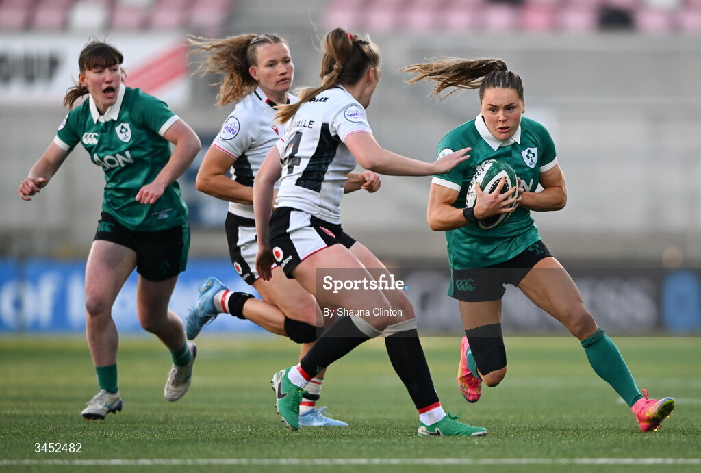 9 May 2026; Béibhinn Parsons of Ireland in action against Hannah Dallavalle of Wales during the Women's 6 Nations Rugby Championship match between Ireland and Wales at Affidea Stadium in Belfast. Photo by Shauna Clinton/Sportsfile