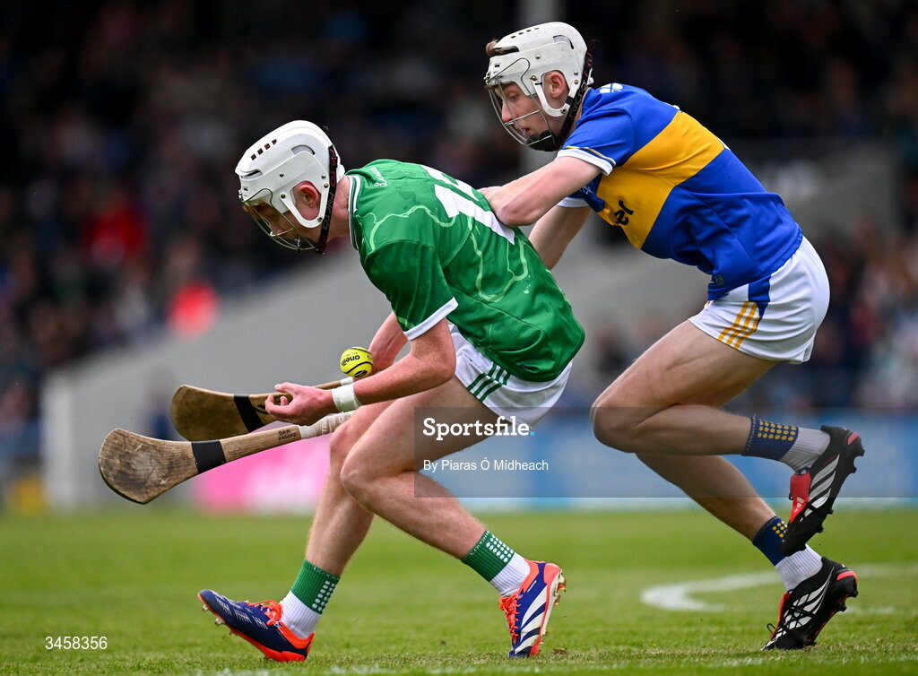 15 May 2026; Daire Long of Limerick in action against Daniel Groome of Tipperary during the Electric Ireland Munster GAA Minor Hurling Championship final match between Tipperary and Limerick at FBD Semple Stadium in Thurles, Tipperary. Photo by Piaras Ó Mídheach/Sportsfile