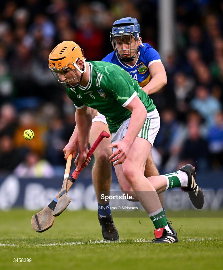 15 May 2026; Conor Ryan of Limerick in action against Chris Dunne of Tipperary during the Electric Ireland Munster GAA Minor Hurling Championship final match between Tipperary and Limerick at FBD Semple Stadium in Thurles, Tipperary. Photo by Piaras Ó Mídheach/Sportsfile