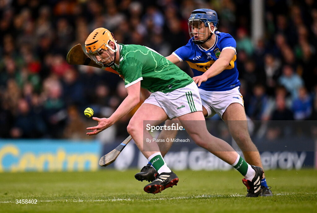 15 May 2026; Conor Ryan of Limerick in action against Chris Dunne of Tipperary during the Electric Ireland Munster GAA Minor Hurling Championship final match between Tipperary and Limerick at FBD Semple Stadium in Thurles, Tipperary. Photo by Piaras Ó Mídheach/Sportsfile
