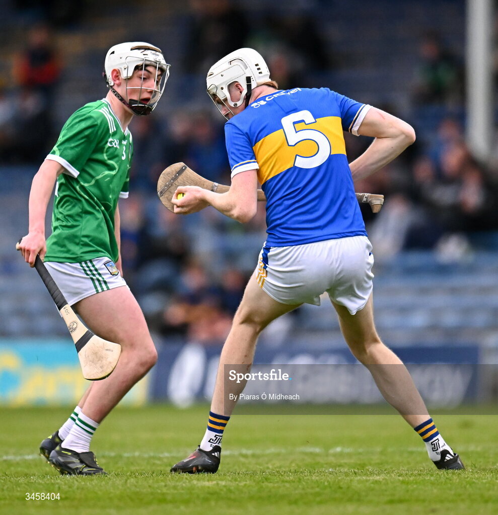 15 May 2026; Oisín Kennedy of Tipperary in action against Eamon O'Sullivan of Limerick during the Electric Ireland Munster GAA Minor Hurling Championship final match between Tipperary and Limerick at FBD Semple Stadium in Thurles, Tipperary. Photo by Piaras Ó Mídheach/Sportsfile