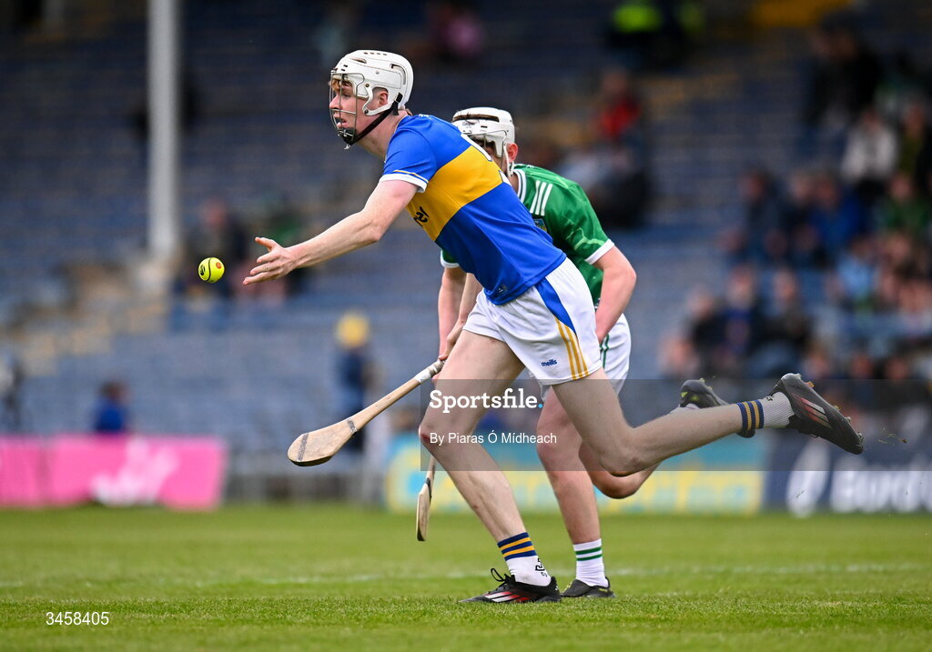 15 May 2026; Oisín Kennedy of Tipperary in action against Eamon O'Sullivan of Limerick during the Electric Ireland Munster GAA Minor Hurling Championship final match between Tipperary and Limerick at FBD Semple Stadium in Thurles, Tipperary. Photo by Piaras Ó Mídheach/Sportsfile