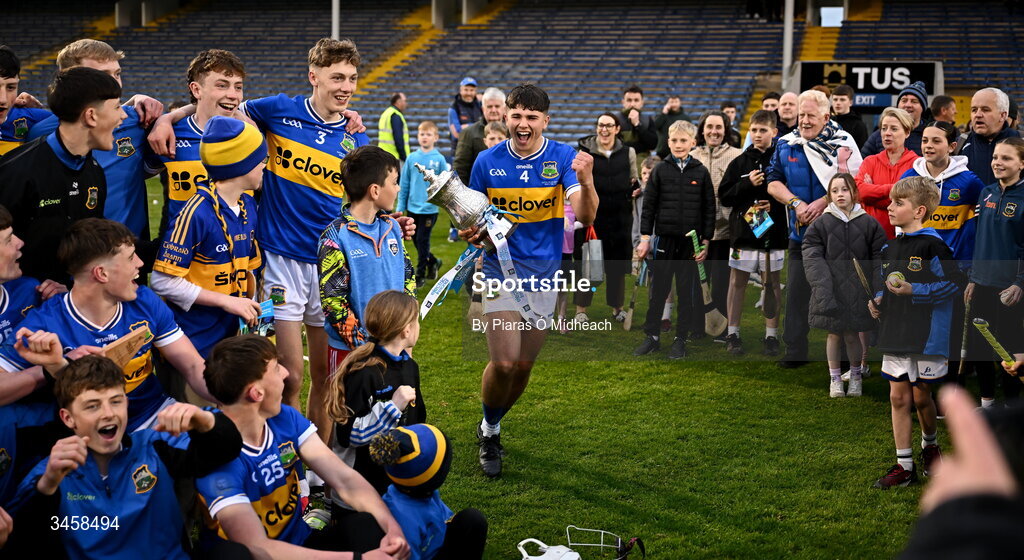 15 May 2026; Tipperary captain Conor Collins brings the cup to his team-mates after victory in the Electric Ireland Munster GAA Minor Hurling Championship final match between Tipperary and Limerick at FBD Semple Stadium in Thurles, Tipperary. Photo by Piaras Ó Mídheach/Sportsfile