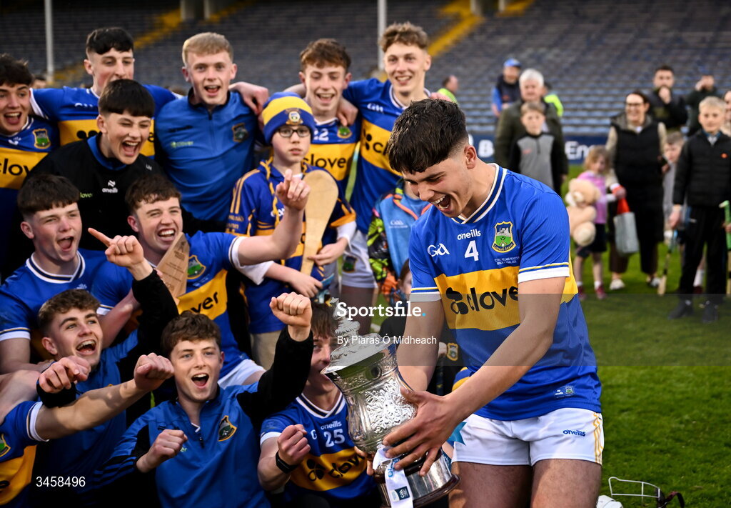15 May 2026; Tipperary captain Conor Collins brings the cup to his team-mates after victory in the Electric Ireland Munster GAA Minor Hurling Championship final match between Tipperary and Limerick at FBD Semple Stadium in Thurles, Tipperary. Photo by Piaras Ó Mídheach/Sportsfile