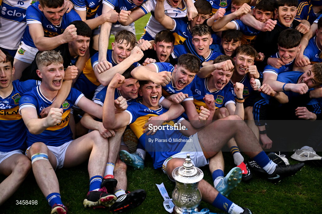 15 May 2026; Tipperary captain Conor Collins, centre, celebrates with team-mates after victory in the Electric Ireland Munster GAA Minor Hurling Championship final match between Tipperary and Limerick at FBD Semple Stadium in Thurles, Tipperary. Photo by Piaras Ó Mídheach/Sportsfile