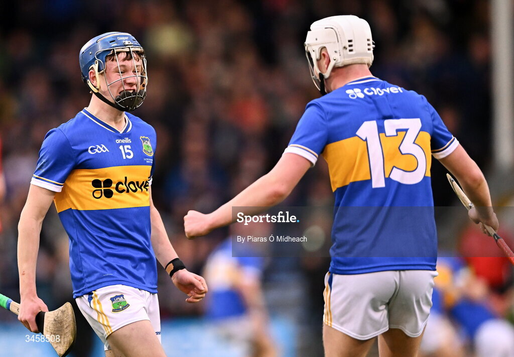 15 May 2026; Tipperary players KJ Dunne, 15, and Zach O'Keeffe celebrates after their side's victory in the Electric Ireland Munster GAA Minor Hurling Championship final match between Tipperary and Limerick at FBD Semple Stadium in Thurles, Tipperary. Photo by Piaras Ó Mídheach/Sportsfile