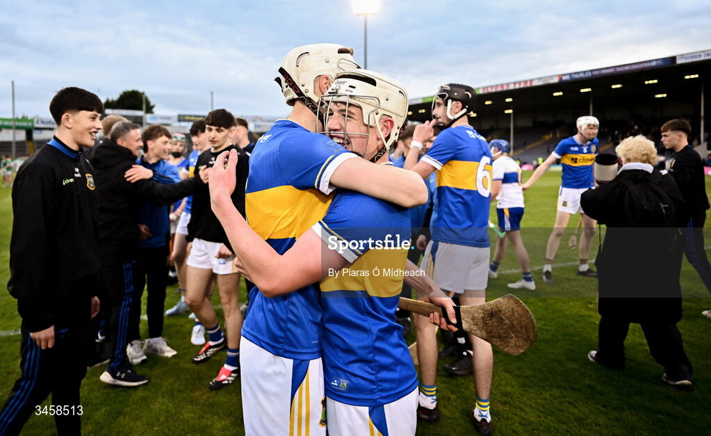 15 May 2026; Tipperary players Daniel Groome, right, and Conall Morrisson celebrate after victory in the Electric Ireland Munster GAA Minor Hurling Championship final match between Tipperary and Limerick at FBD Semple Stadium in Thurles, Tipperary. Photo by Piaras Ó Mídheach/Sportsfile