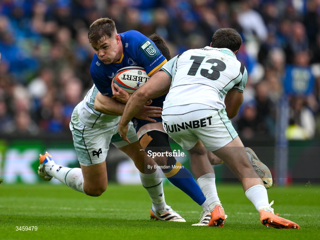 16 May 2026; Garry Ringrose of Leinster is tackled by Owen Watkin and Evardi Boshoff of Ospreys during the United Rugby Championship match between Leinster and Ospreys at the Aviva Stadium in Dublin. Photo by Brendan Moran/Sportsfile