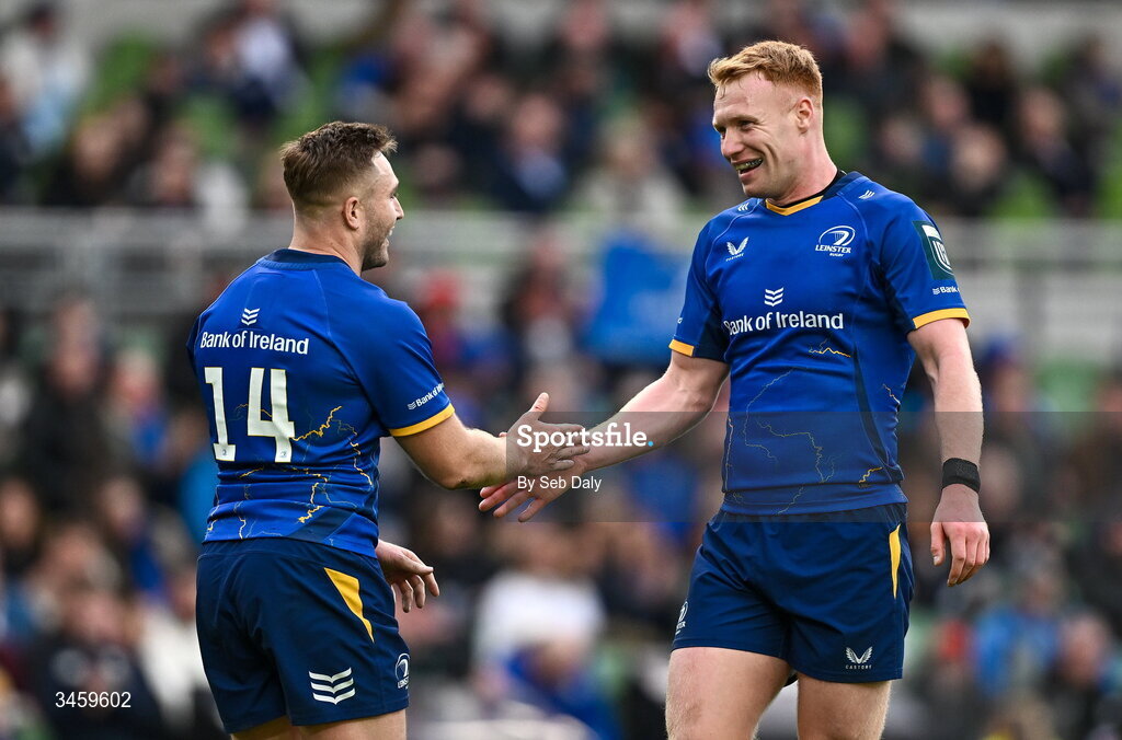 16 May 2026; Jordan Larmour of Leinster, left, celebrates with teammate Ciarán Frawley after scoring their side's eighth try during the United Rugby Championship match between Leinster and Ospreys at the Aviva Stadium in Dublin. Photo by Seb Daly/Sportsfile