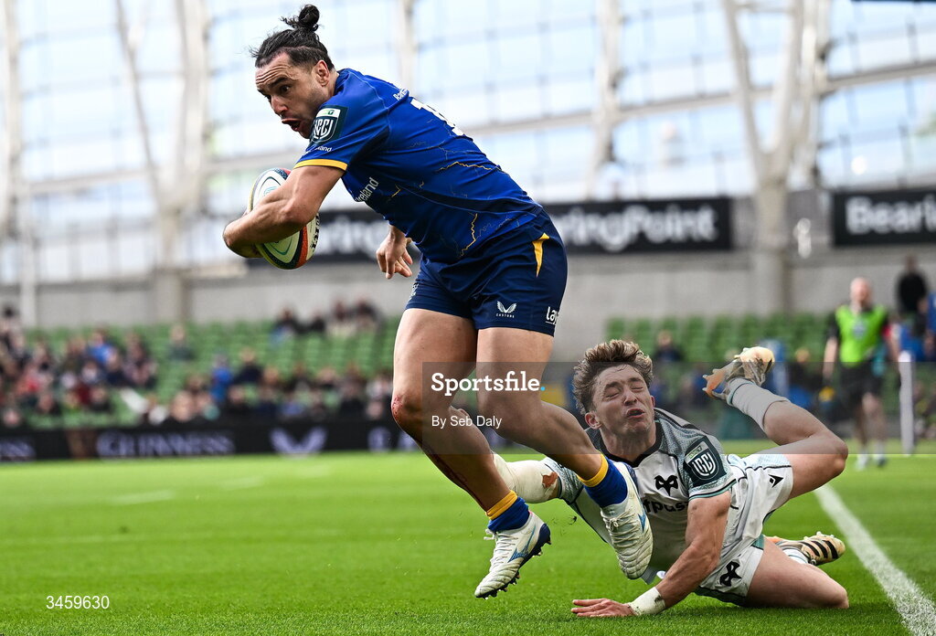 16 May 2026; James Lowe of Leinster evades the tackle of Ospreys' Dan Edwards on his way to scoring his side's 10th try during the United Rugby Championship match between Leinster and Ospreys at the Aviva Stadium in Dublin. Photo by Seb Daly/Sportsfile