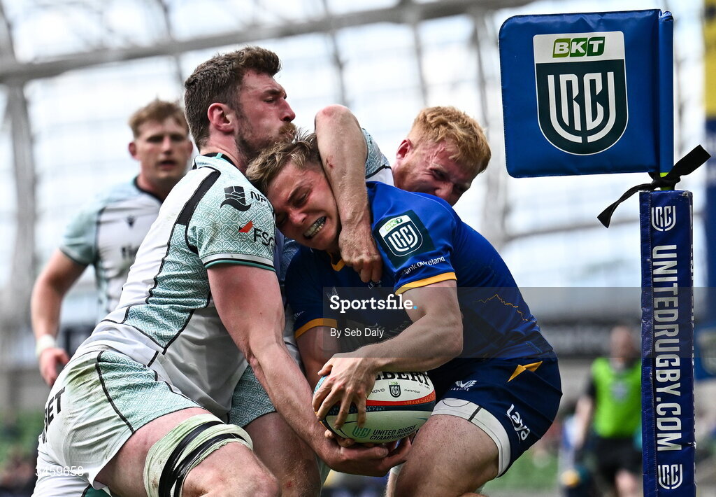16 May 2026; Fintan Gunne of Leinster is tackled by Ospreys players James Ratti and Iestyn Hopkins during the United Rugby Championship match between Leinster and Ospreys at the Aviva Stadium in Dublin. Photo by Seb Daly/Sportsfile