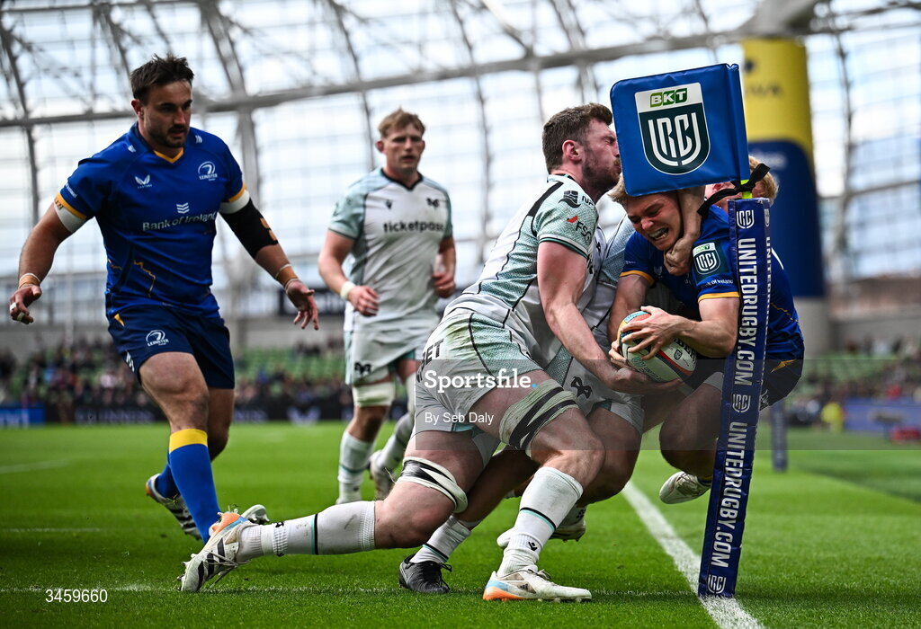 16 May 2026; Fintan Gunne of Leinster is tackled by Ospreys players James Ratti and Iestyn Hopkins during the United Rugby Championship match between Leinster and Ospreys at the Aviva Stadium in Dublin. Photo by Seb Daly/Sportsfile