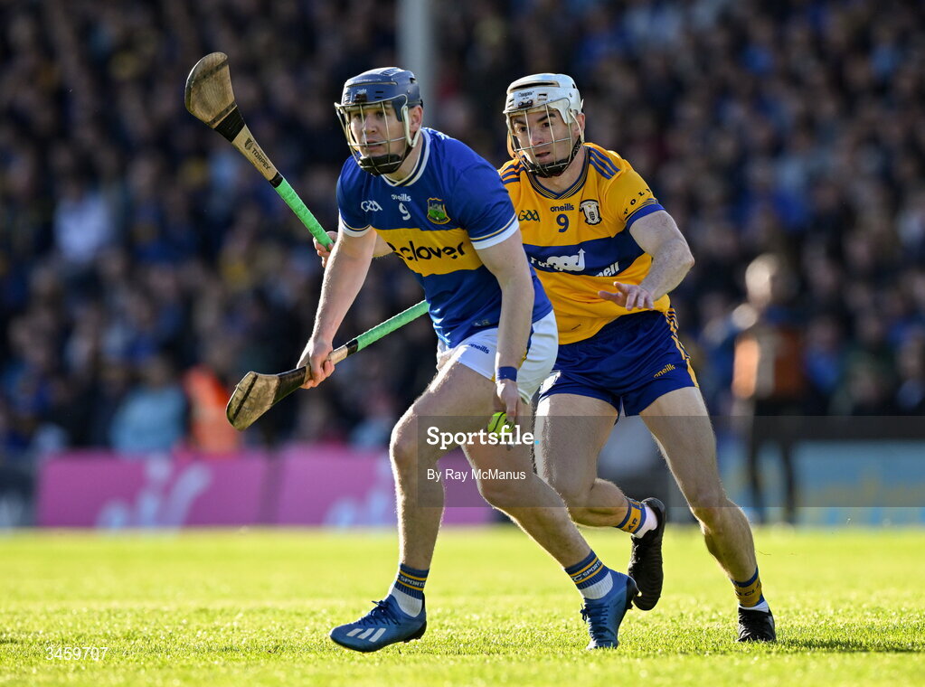 16 May 2026; Alan Tynan of Tipperary is tackled by Ryan Taylor of Clare during the Munster GAA Senior Hurling Championship Round 4 match between Tipperary and Clare at FBD Semple Stadium in Thurles, Tipperary. Photo by Ray McManus/Sportsfile