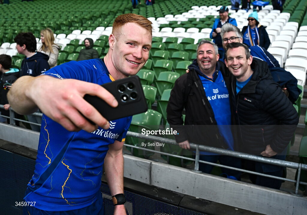 16 May 2026; Ciarán Frawley of Leinster with supporters after the United Rugby Championship match between Leinster and Ospreys at the Aviva Stadium in Dublin. Photo by Seb Daly/Sportsfile
