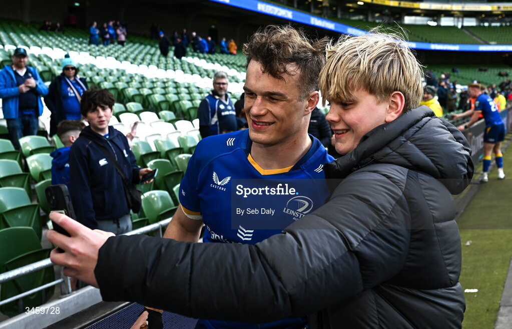 16 May 2026; Josh van der Flier of Leinster with a supporter after the United Rugby Championship match between Leinster and Ospreys at the Aviva Stadium in Dublin. Photo by Seb Daly/Sportsfile