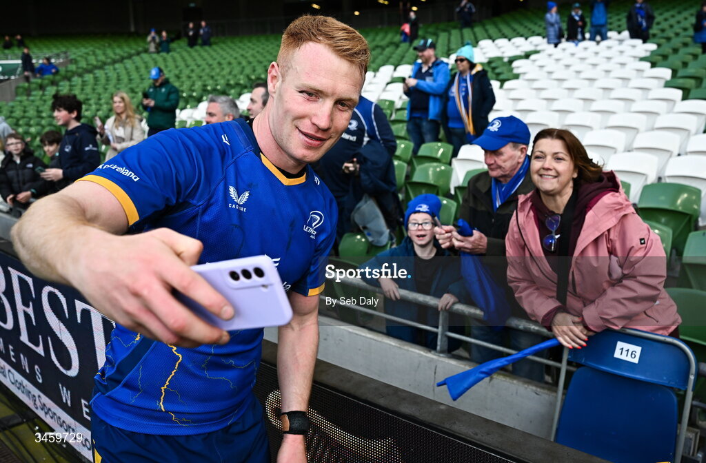 16 May 2026; Ciarán Frawley of Leinster with supporters after the United Rugby Championship match between Leinster and Ospreys at the Aviva Stadium in Dublin. Photo by Seb Daly/Sportsfile
