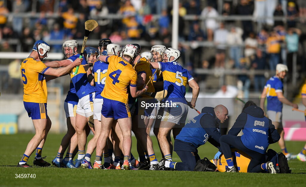 16 May 2026; Clare and Tipperary players tussle while Mark Rodgers of Clare receives medical attention for an injury during the Munster GAA Senior Hurling Championship Round 4 match between Tipperary and Clare at FBD Semple Stadium in Thurles, Tipperary. Photo by John Sheridan/Sportsfile