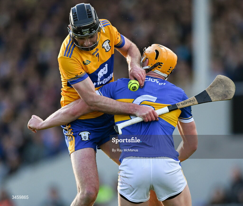 16 May 2026; Cathal Malone of Clare is tackled by Ronan Maher of Tipperary during the Munster GAA Senior Hurling Championship Round 4 match between Tipperary and Clare at FBD Semple Stadium in Thurles, Tipperary. Photo by Ray McManus/Sportsfile