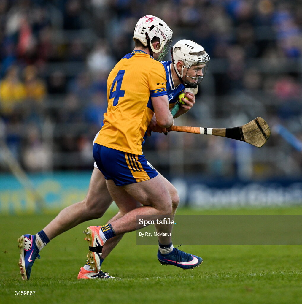 16 May 2026; Oisin O'Donoghue of Tipperary is tackled by Adam Hogan of Clare during the Munster GAA Senior Hurling Championship Round 4 match between Tipperary and Clare at FBD Semple Stadium in Thurles, Tipperary. Photo by Ray McManus/Sportsfile