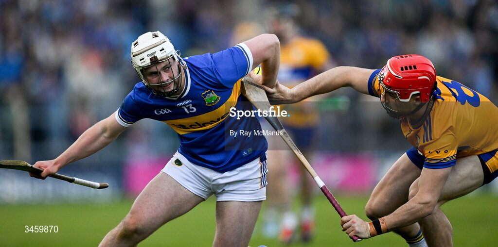 16 May 2026; Darragh McCarthy of Tipperary is tackled by Darragh Lohan of Clare during the Munster GAA Senior Hurling Championship Round 4 match between Tipperary and Clare at FBD Semple Stadium in Thurles, Tipperary. Photo by Ray McManus/Sportsfile