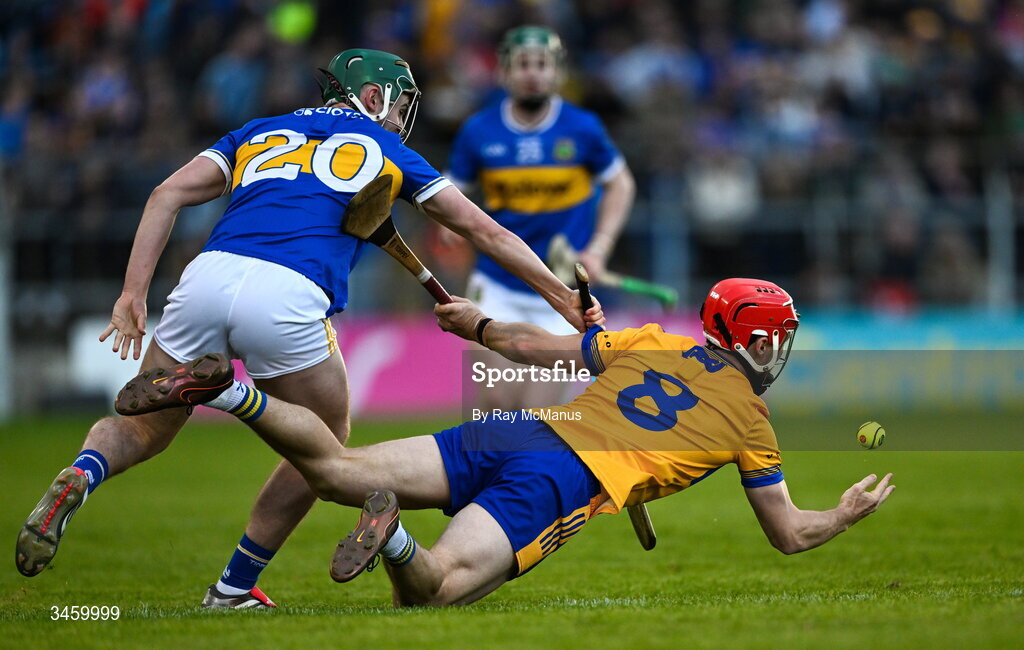 16 May 2026; Darragh Lohan of Clare is tackled by Sam O'Farrell during the Munster GAA Senior Hurling Championship Round 4 match between Tipperary and Clare at FBD Semple Stadium in Thurles, Tipperary. Photo by Ray McManus/Sportsfile