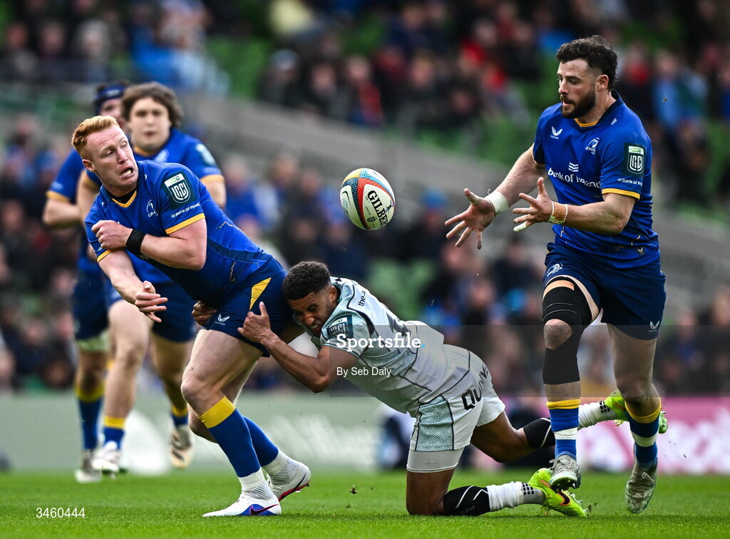 16 May 2026; Ciarán Frawley of Leinster offloads to teammate Robbie Henshaw, as he is tackled by Keelan Giles of Ospreys, during the United Rugby Championship match between Leinster and Ospreys at the Aviva Stadium in Dublin. Photo by Seb Daly/Sportsfile