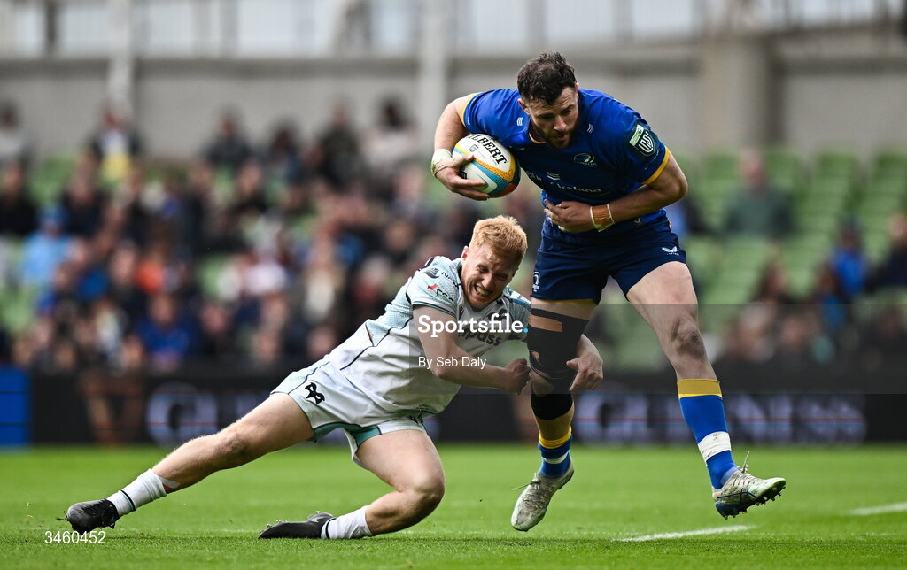 16 May 2026; Robbie Henshaw of Leinster is tackled by Iestyn Hopkins of Ospreys during the United Rugby Championship match between Leinster and Ospreys at the Aviva Stadium in Dublin. Photo by Seb Daly/Sportsfile