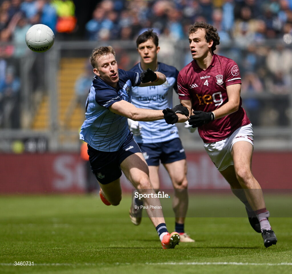 17 May 2026; Tadhg Baker of Westmeath passes the ball ahead of Seán Bugler of Dublin during the Leinster GAA Football Senior Championship final match between Dublin and Westmeath at Croke Park in Dublin. Photo by Paul Phelan/Sportsfile