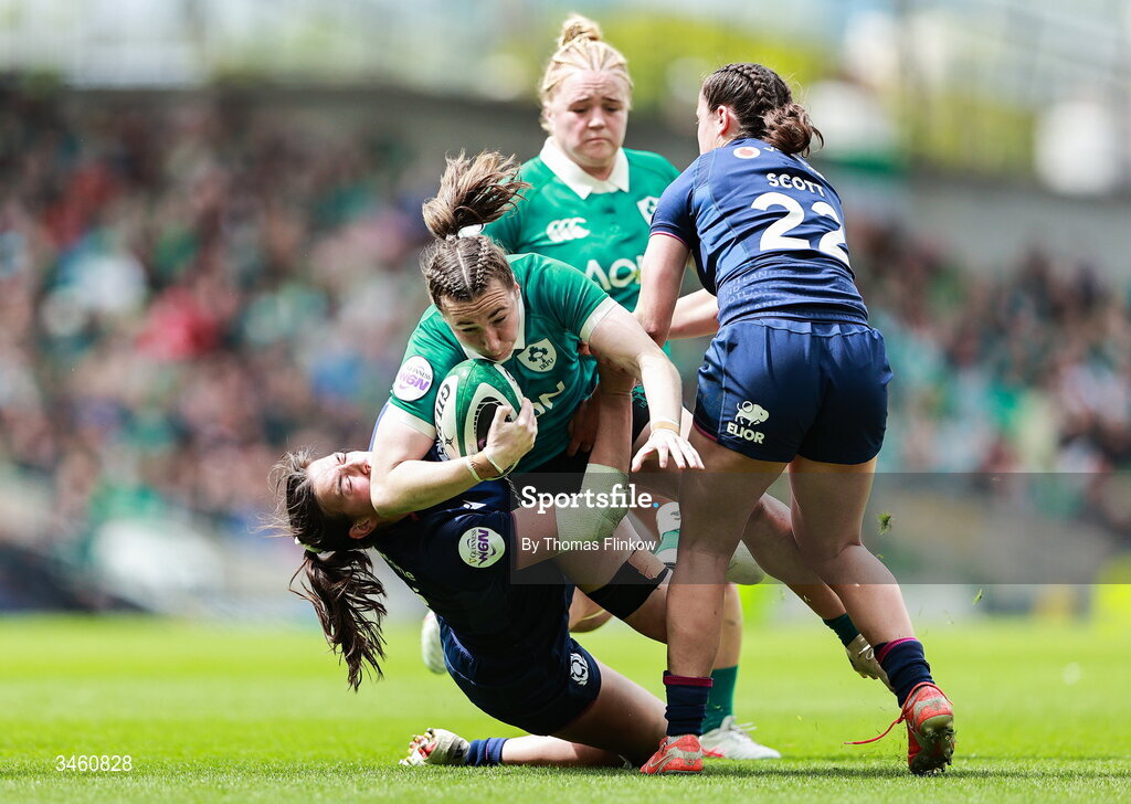 17 May 2026; Eve Higgins of Ireland in action against Rachel Philipps, left, and Lucia Scott of Scotland during the Women's 6 Nations Rugby Championship match between Ireland and Scotland at the Aviva Stadium in Dublin. Photo by Thomas Flinkow/Sportsfile