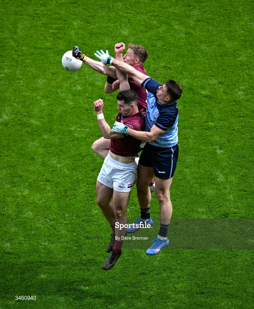 17 May 2026; Brian Howard of Dublin in action against Ray Connellan, top, and Sam McCartan of Westmeath during the Leinster GAA Football Senior Championship final match between Dublin and Westmeath at Croke Park in Dublin. Photo by Daire Brennan/Sportsfile