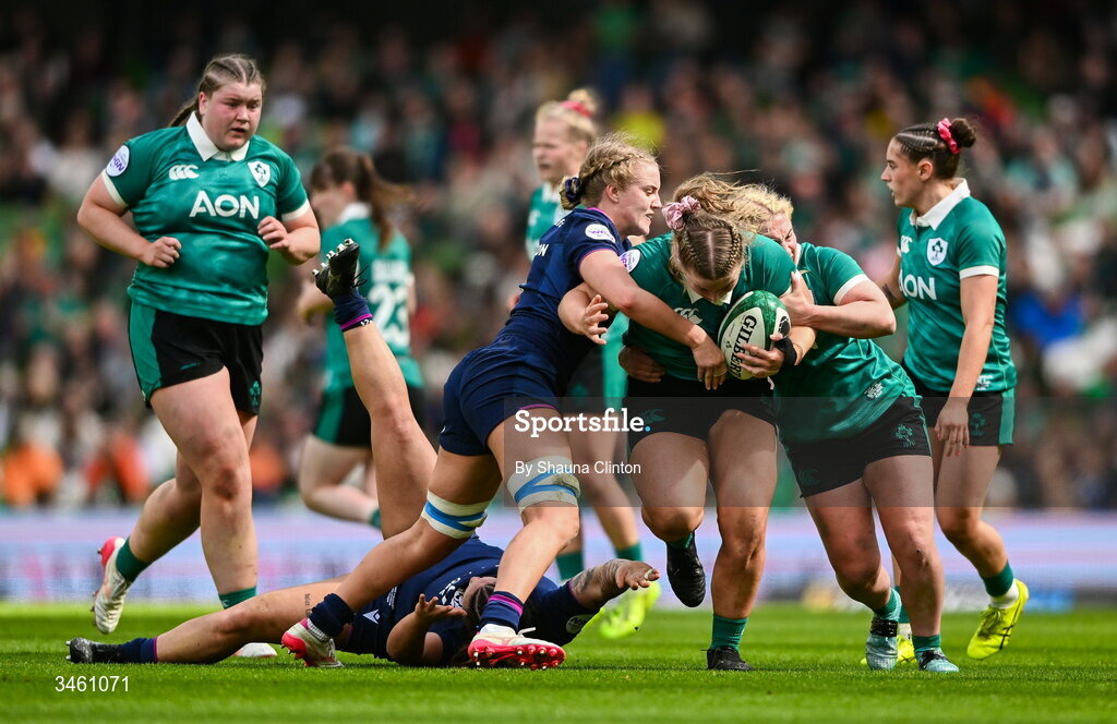 17 May 2026; Sadhbh McGrath of Ireland is tackled by Eva Donaldson of Scotland during the Women's 6 Nations Rugby Championship match between Ireland and Scotland at the Aviva Stadium in Dublin. Photo by Shauna Clinton/Sportsfile