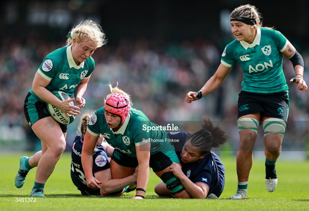 17 May 2026; Dorothy Wall of Ireland passes the ball to teammate Neve Jones during the Women's 6 Nations Rugby Championship match between Ireland and Scotland at the Aviva Stadium in Dublin. Photo by Thomas Flinkow/Sportsfile