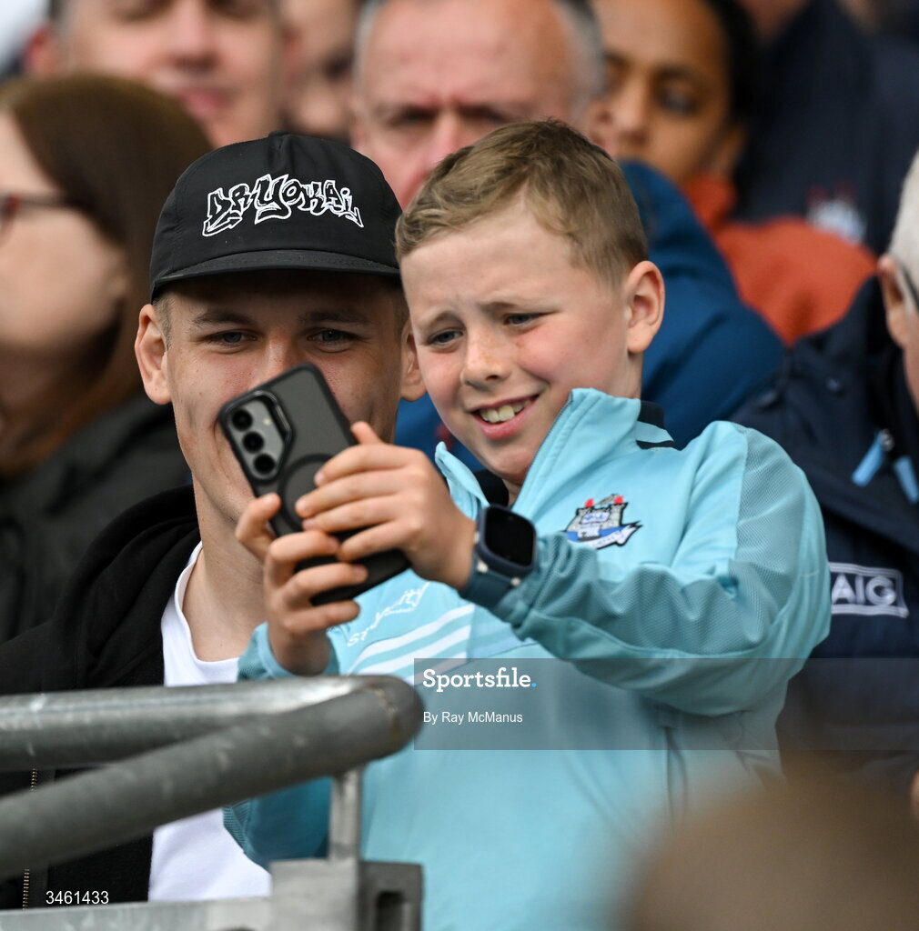 17 May 2026; Nine year old Louis Kelly takes a selfie with Leinster and Ireland player Sam Prendergast at the Leinster GAA Football Senior Championship final match between Dublin and Westmeath at Croke Park in Dublin. Photo by Ray McManus/Sportsfile